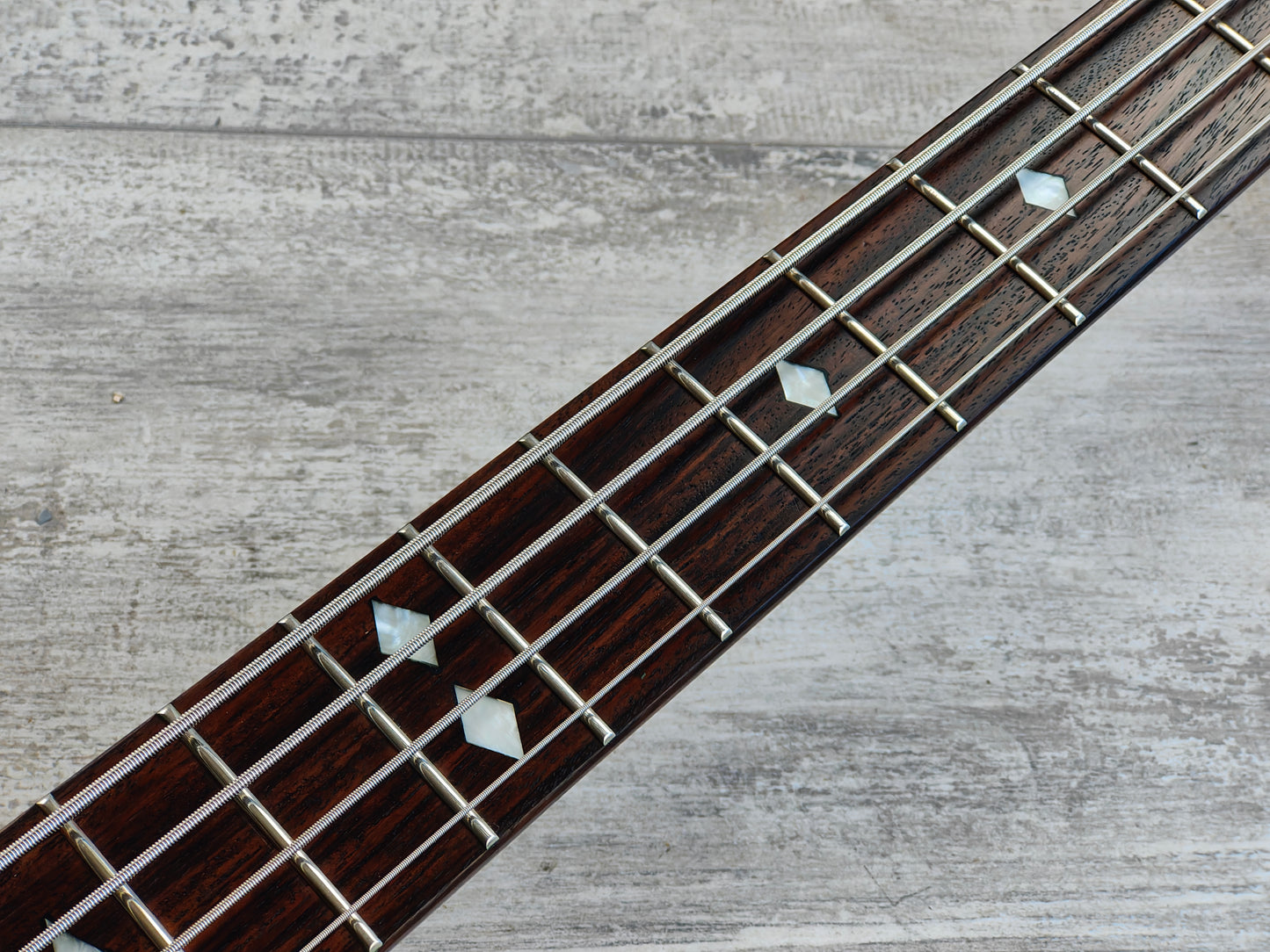 2000's BC Rich Mockingbird Bass (Transparent Grey Burst)