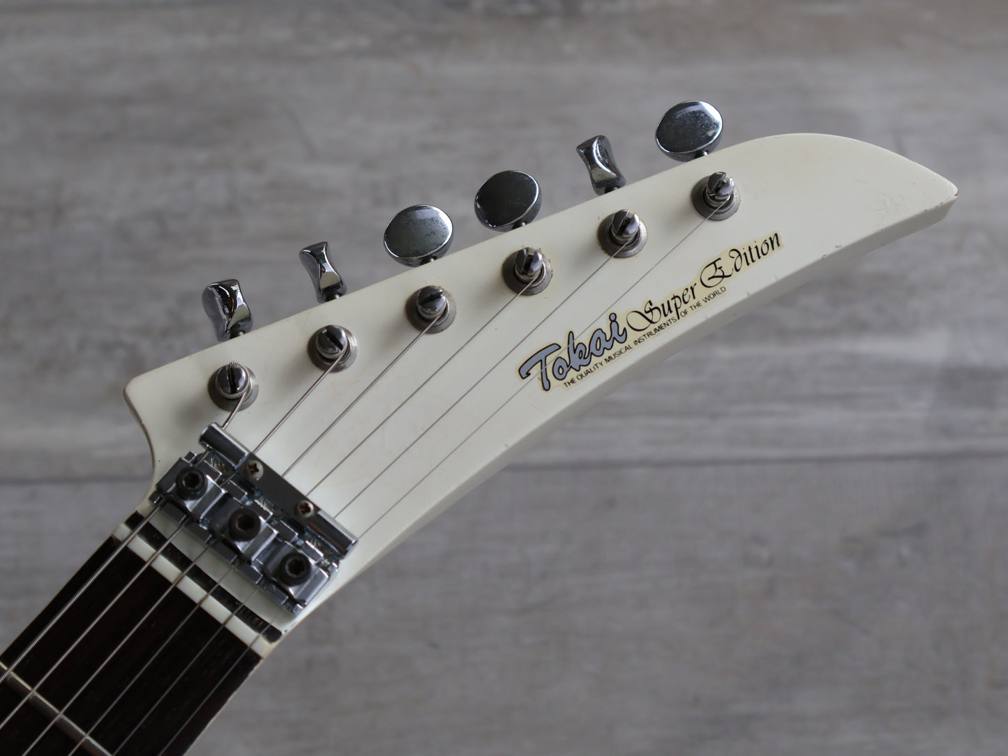 1982 Tokai F-55 Super Edition Explorer/Random Star (Vintage White)