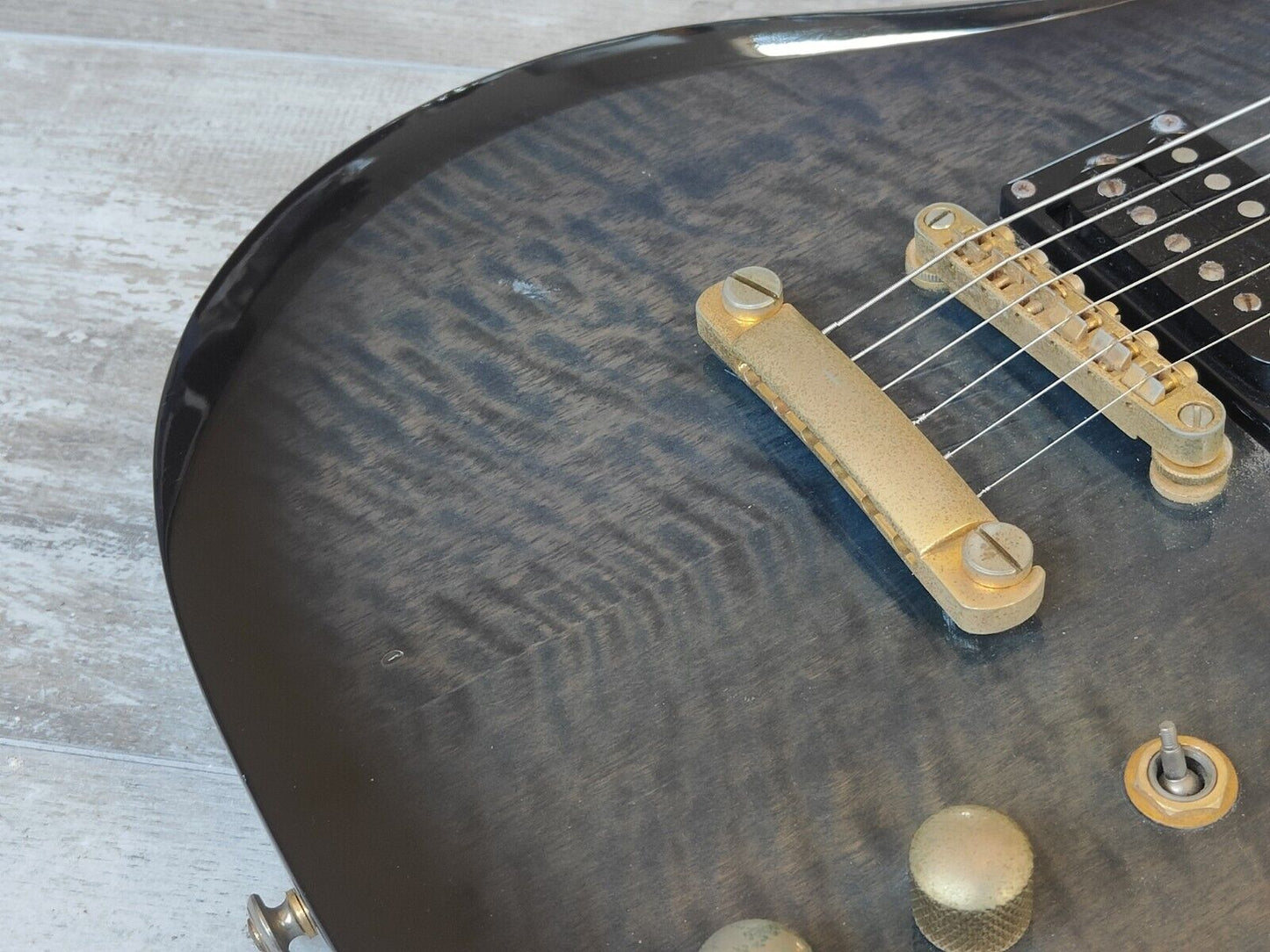 2000's BC Rich Eagle (Transparent Blue Black Flame Burst)