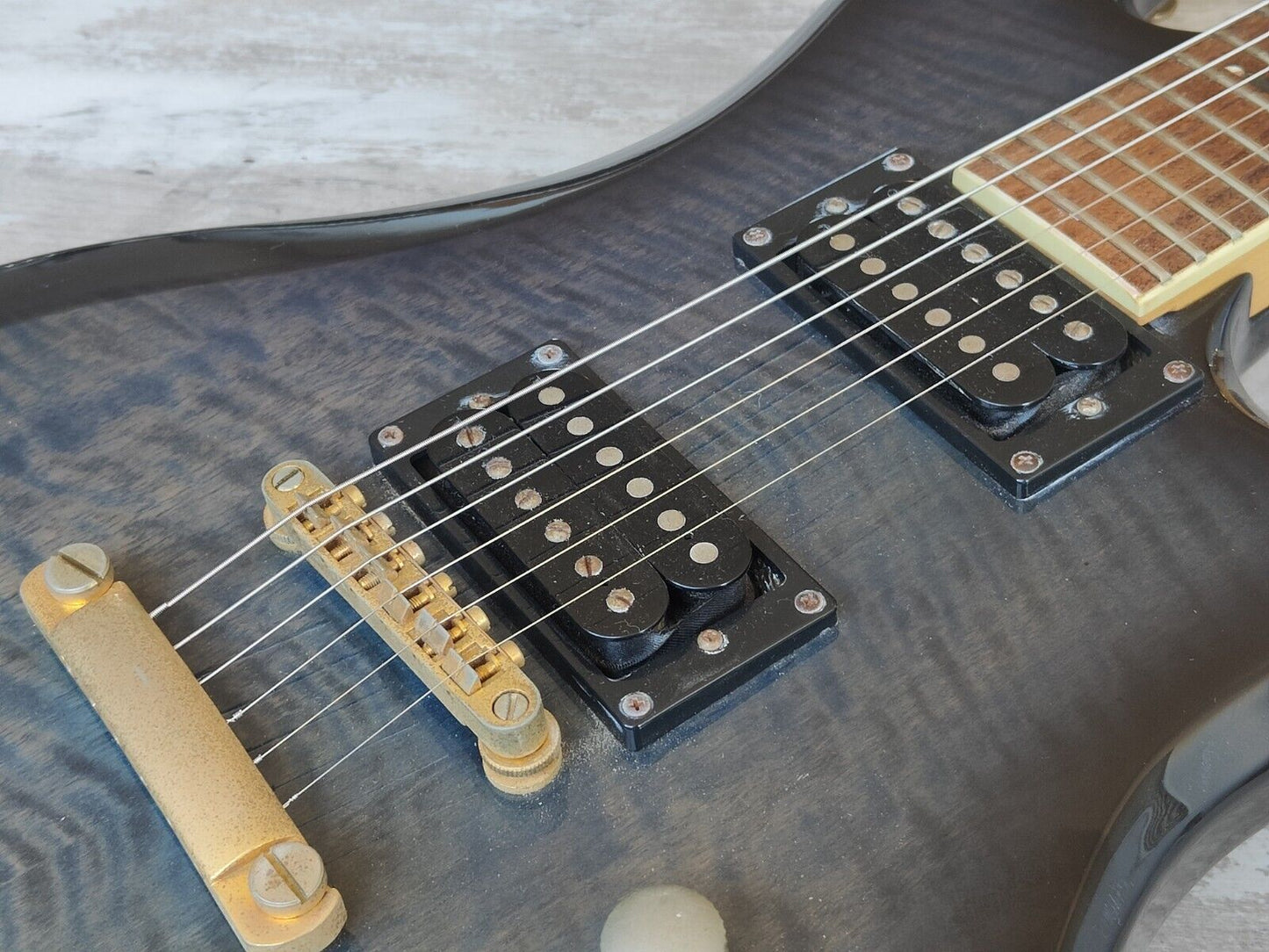 2000's BC Rich Eagle (Transparent Blue Black Flame Burst)