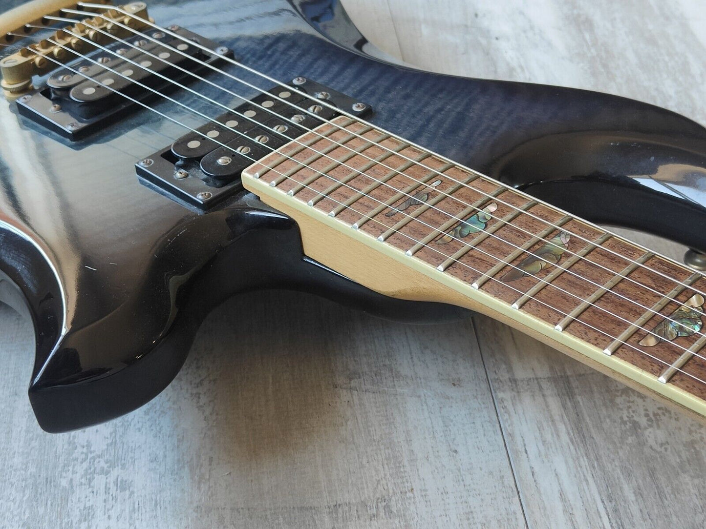 2000's BC Rich Eagle (Transparent Blue Black Flame Burst)