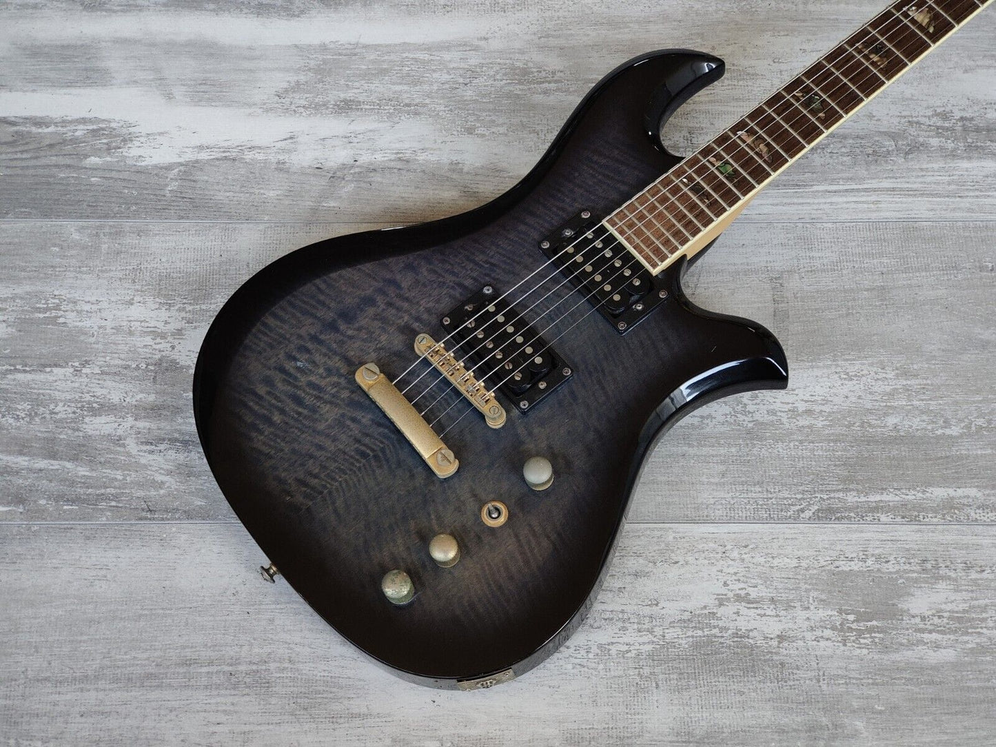 2000's BC Rich Eagle (Transparent Blue Black Flame Burst)