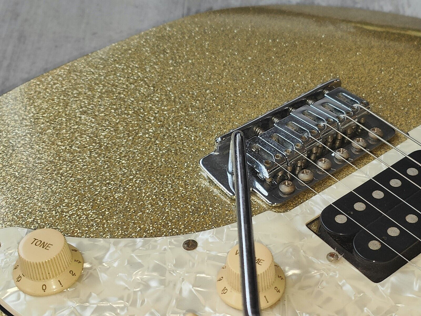 1990's Ibanez HSH RG Superstrat (Metallic Gold Flake w/Matching Headstock)