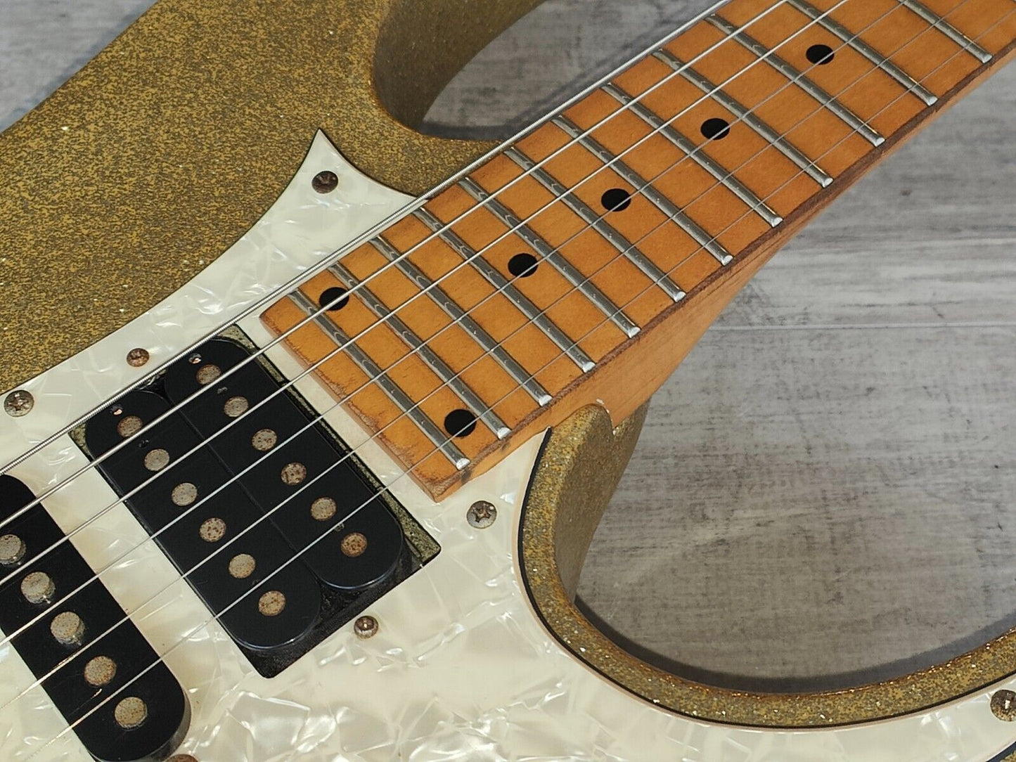 1990's Ibanez HSH RG Superstrat (Metallic Gold Flake w/Matching Headstock)
