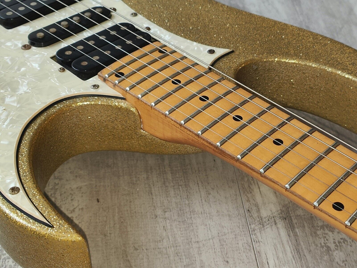 1990's Ibanez HSH RG Superstrat (Metallic Gold Flake w/Matching Headstock)