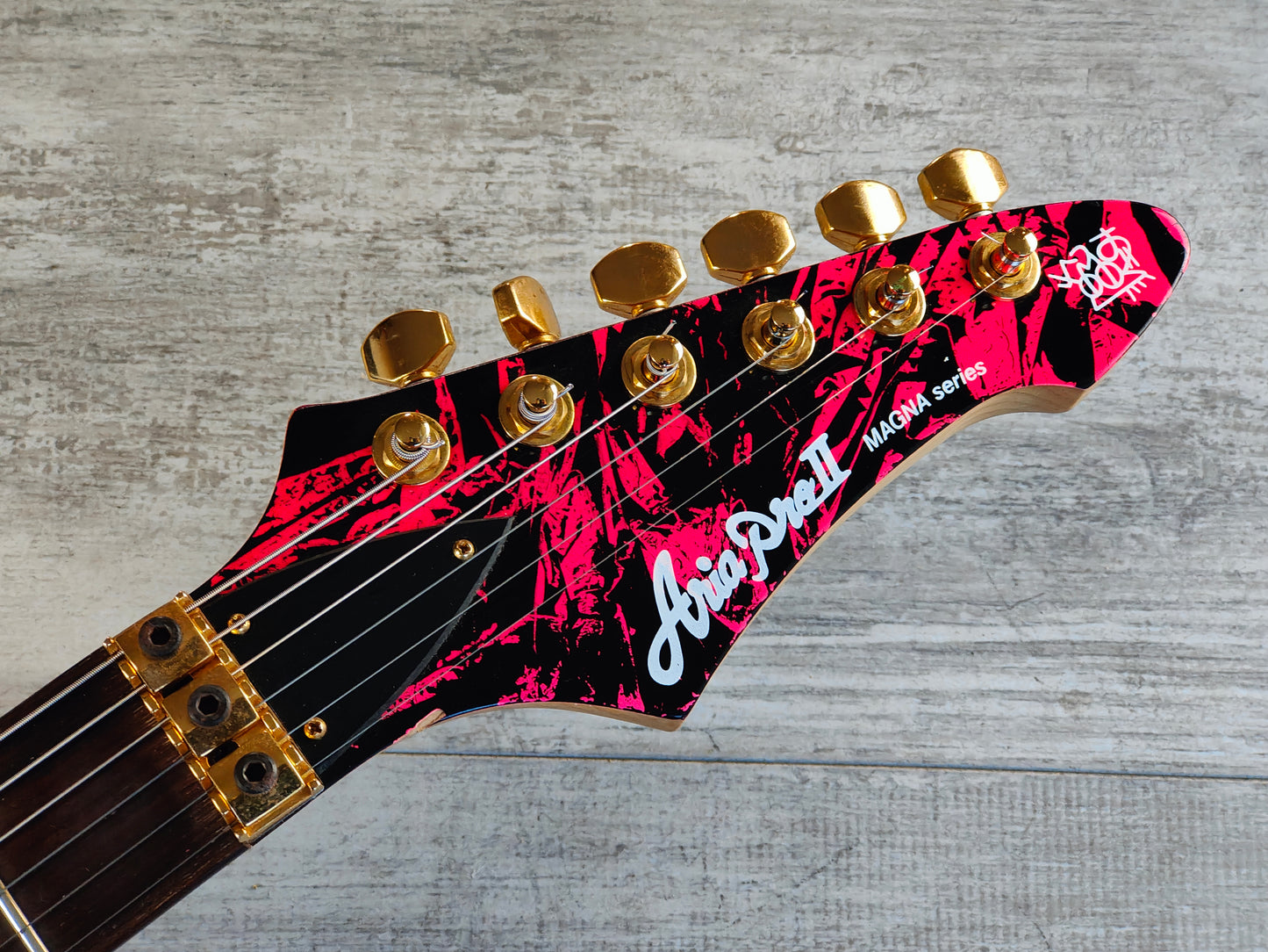 1990 Aria Pro II Japan Magna "Aura" Artist Model Superstrat (Pink Graffiti)