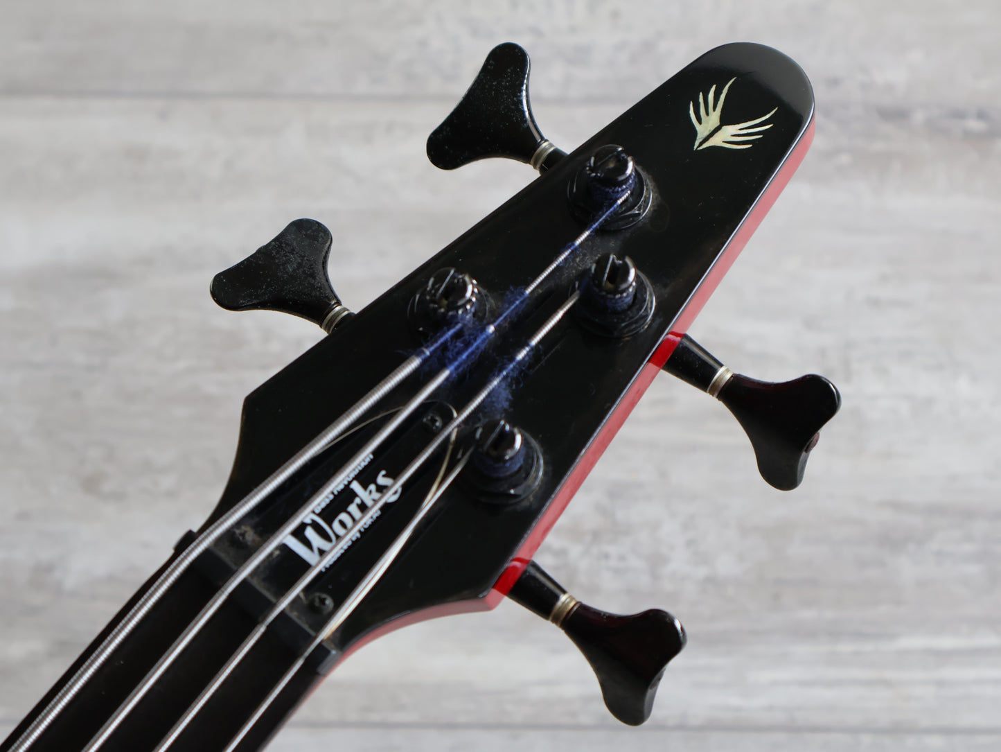 1987 Tokai Japan (Works Bass Revolution) TW-1500 Fretless Bass (Transparent Red)