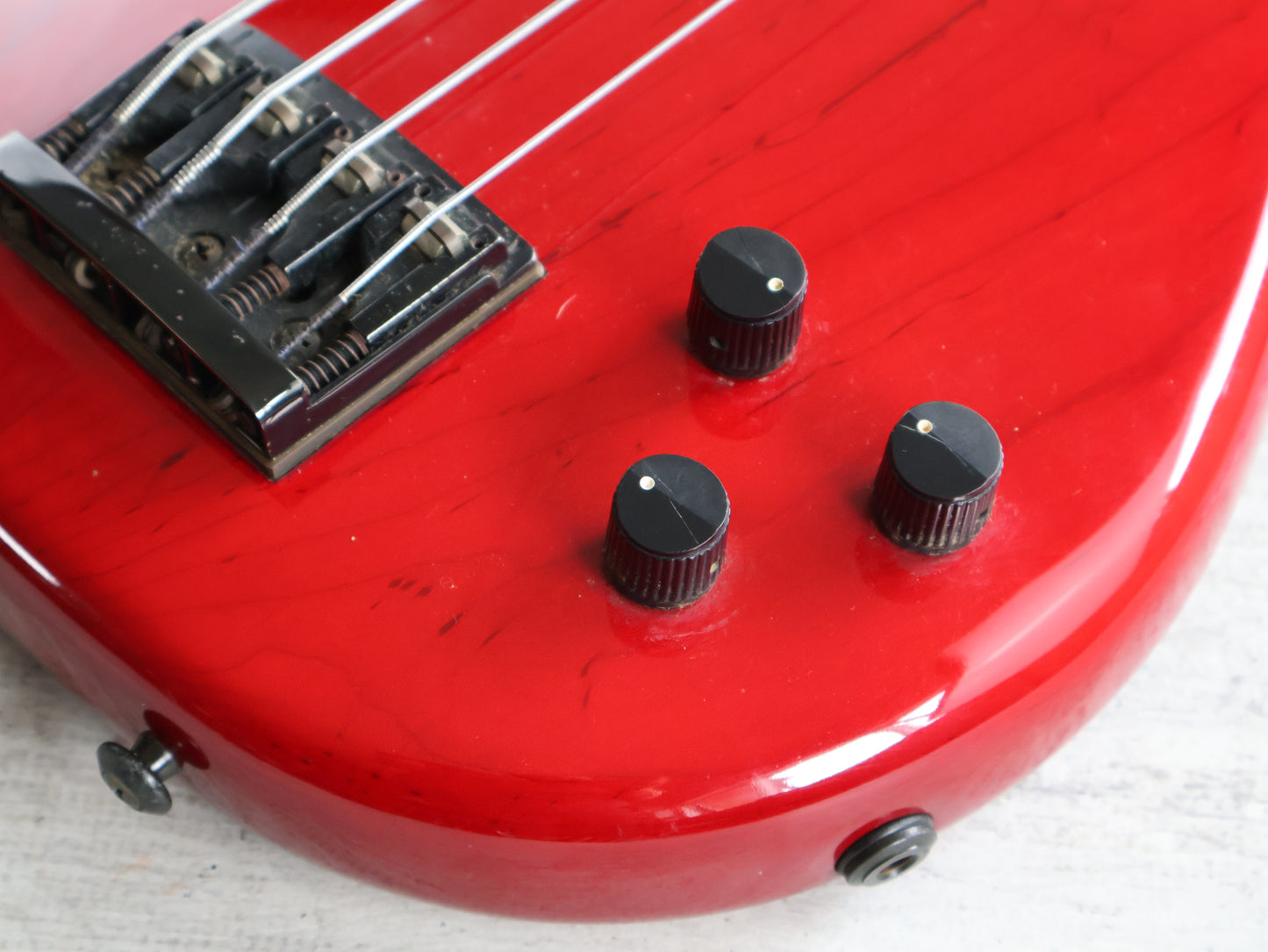 1987 Tokai Japan (Works Bass Revolution) TW-1500 Fretless Bass (Transparent Red)