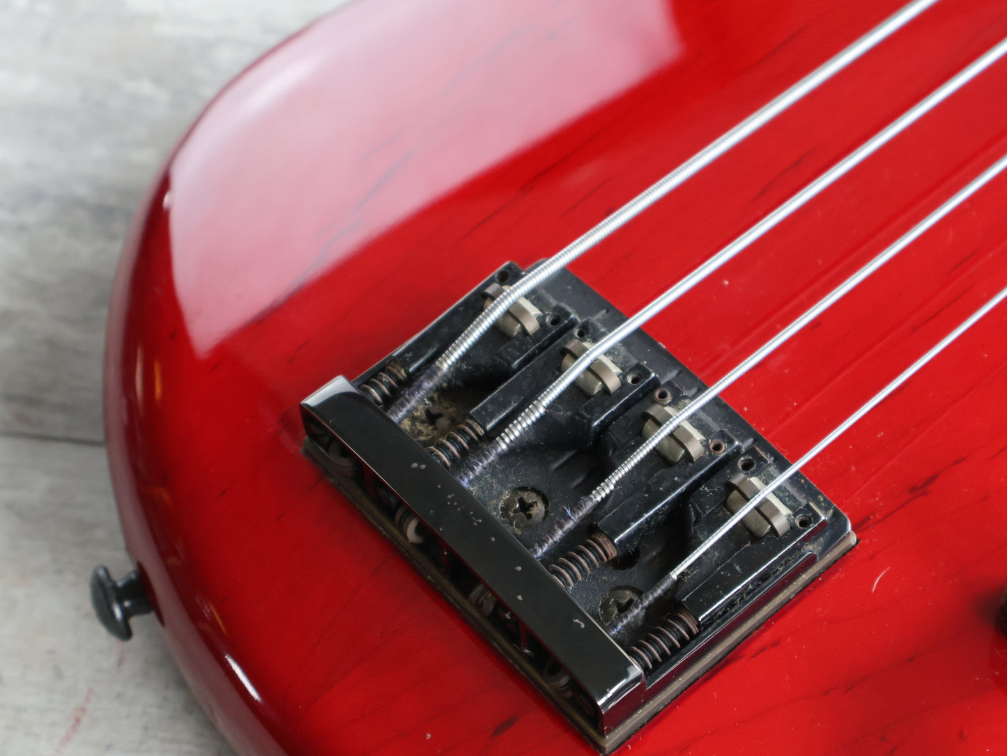 1987 Tokai Japan (Works Bass Revolution) TW-1500 Fretless Bass (Transparent Red)