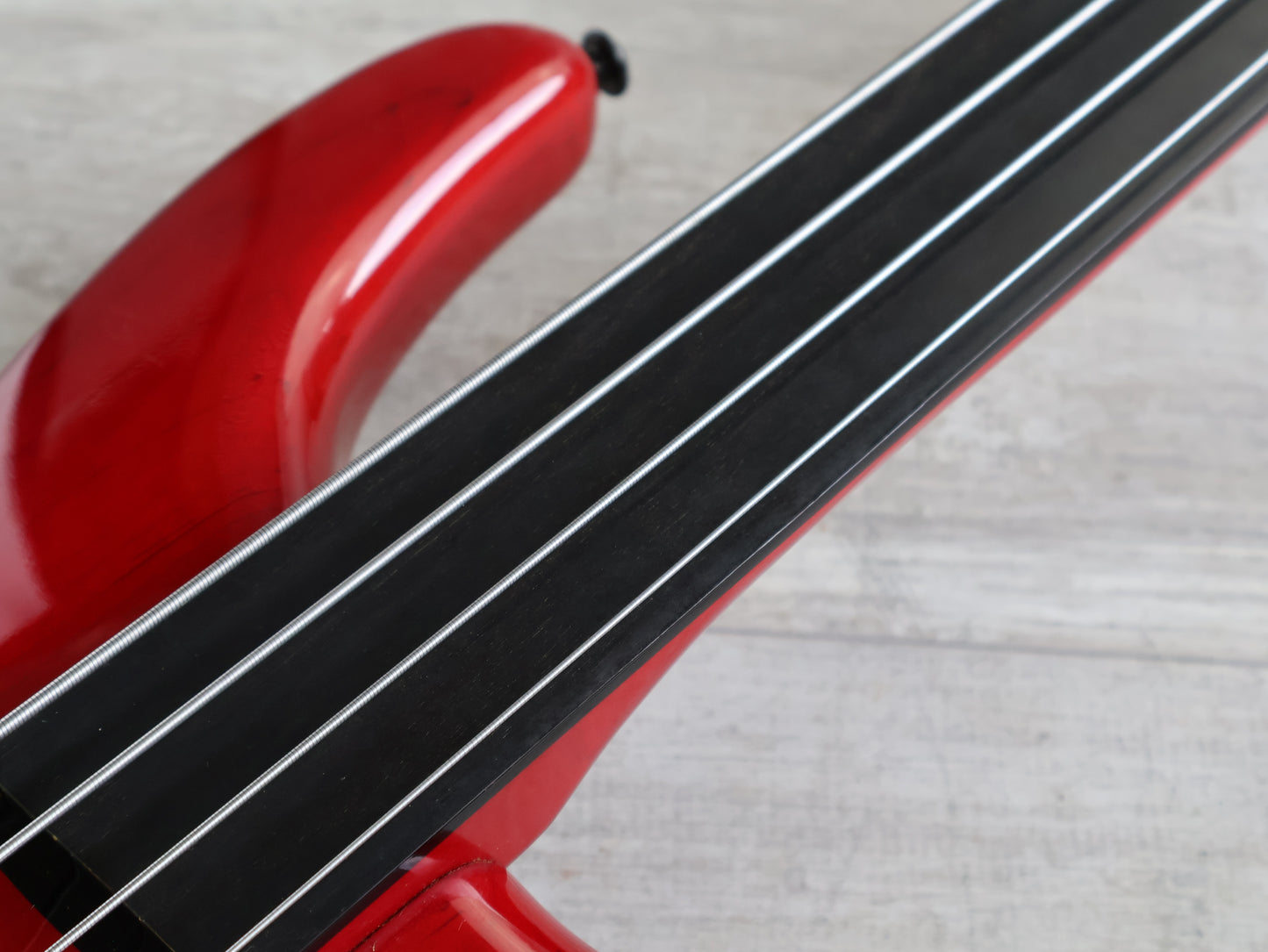 1987 Tokai Japan (Works Bass Revolution) TW-1500 Fretless Bass (Transparent Red)