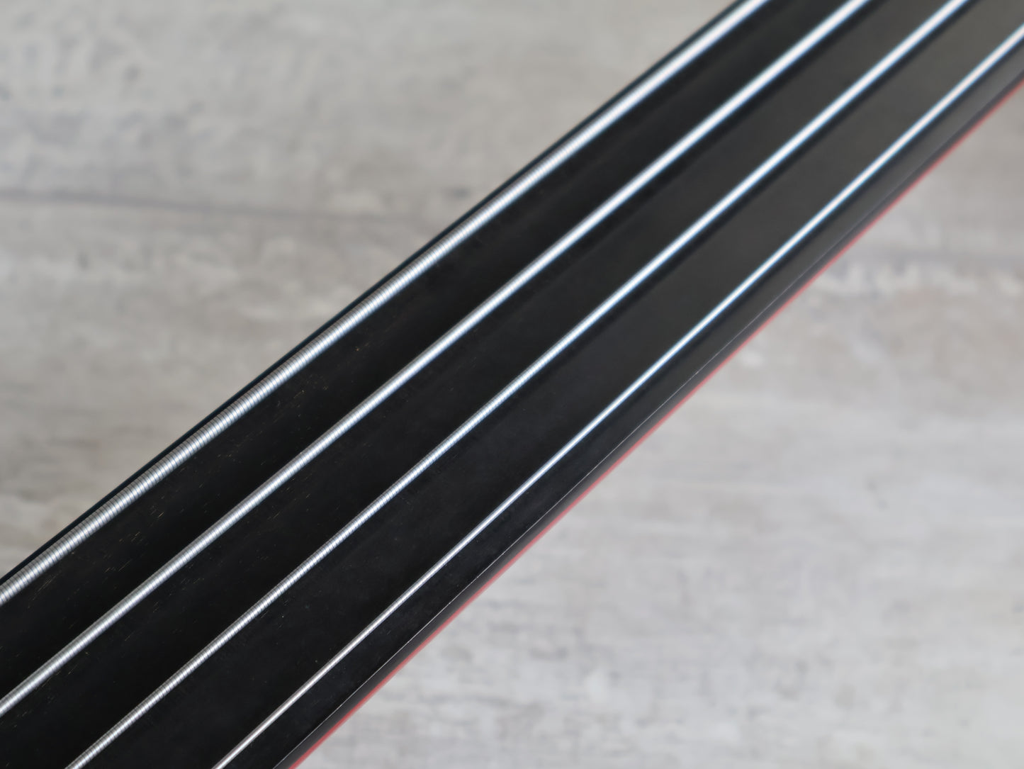 1987 Tokai Japan (Works Bass Revolution) TW-1500 Fretless Bass (Transparent Red)