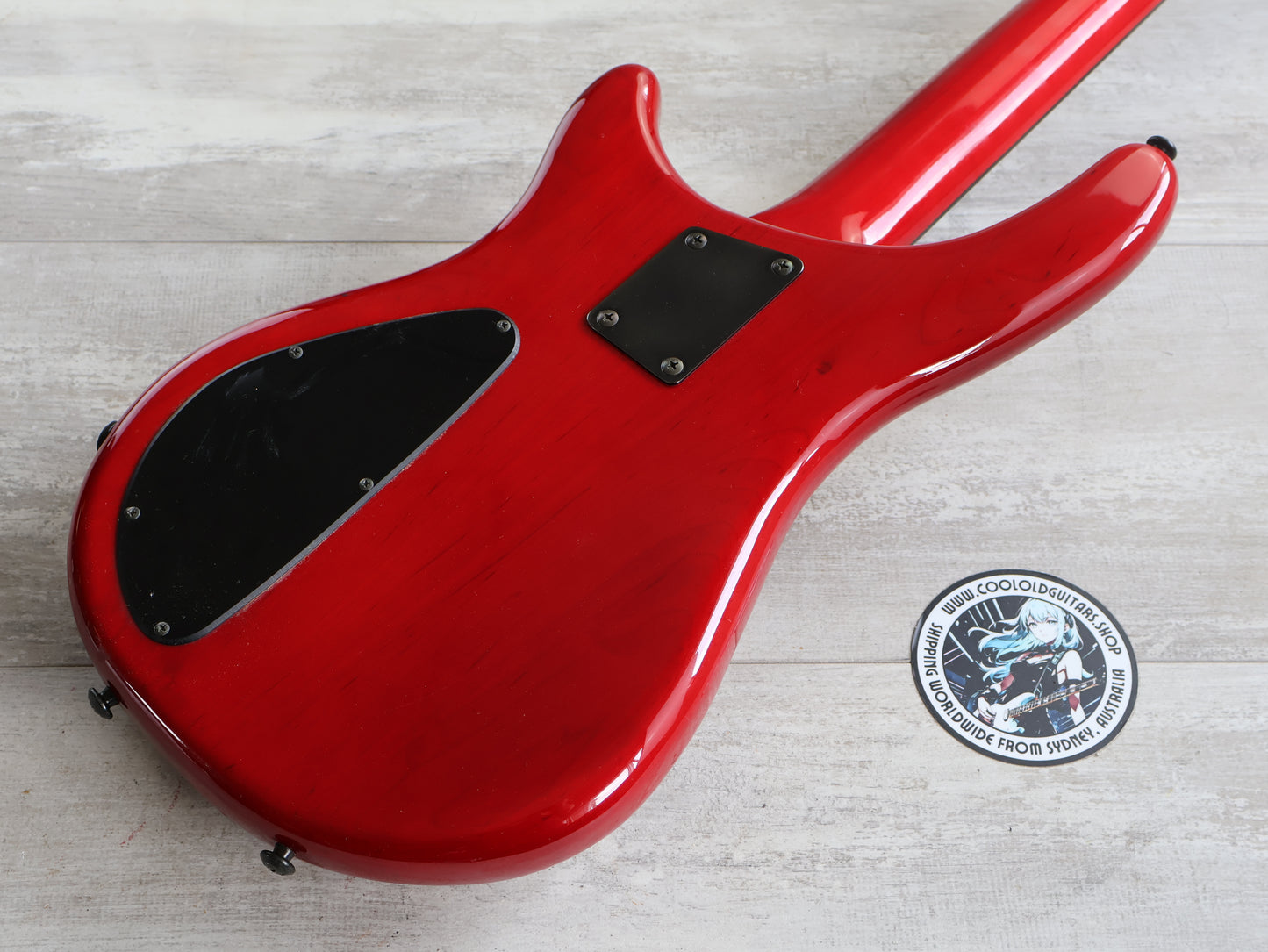 1987 Tokai Japan (Works Bass Revolution) TW-1500 Fretless Bass (Transparent Red)