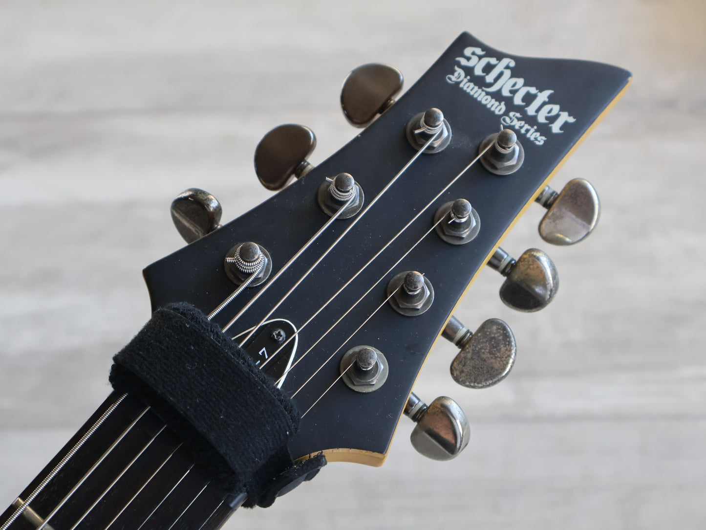 2010 Schecter Demon-7 ABS w/EMG Pickups (Aged Satin Black)