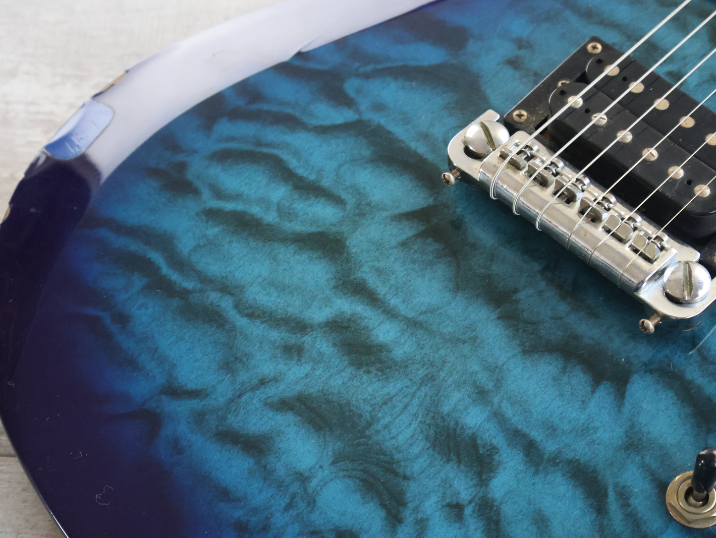 2000's BC Rich Eagle (Aquamarine Sunburst)