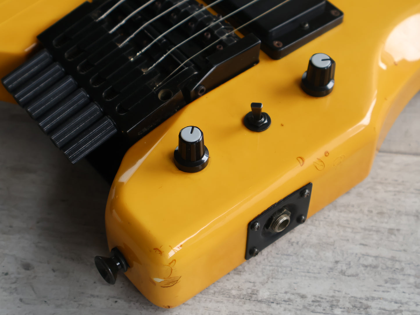 1986 Aria Pro II Japan Interceptor-II Headless Guitar (Yellowed White)