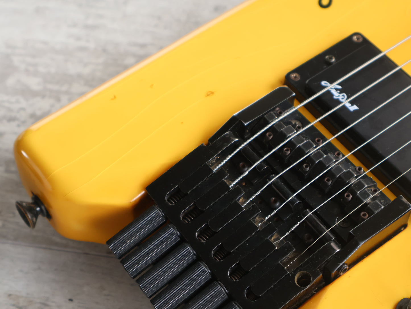 1986 Aria Pro II Japan Interceptor-II Headless Guitar (Yellowed White)