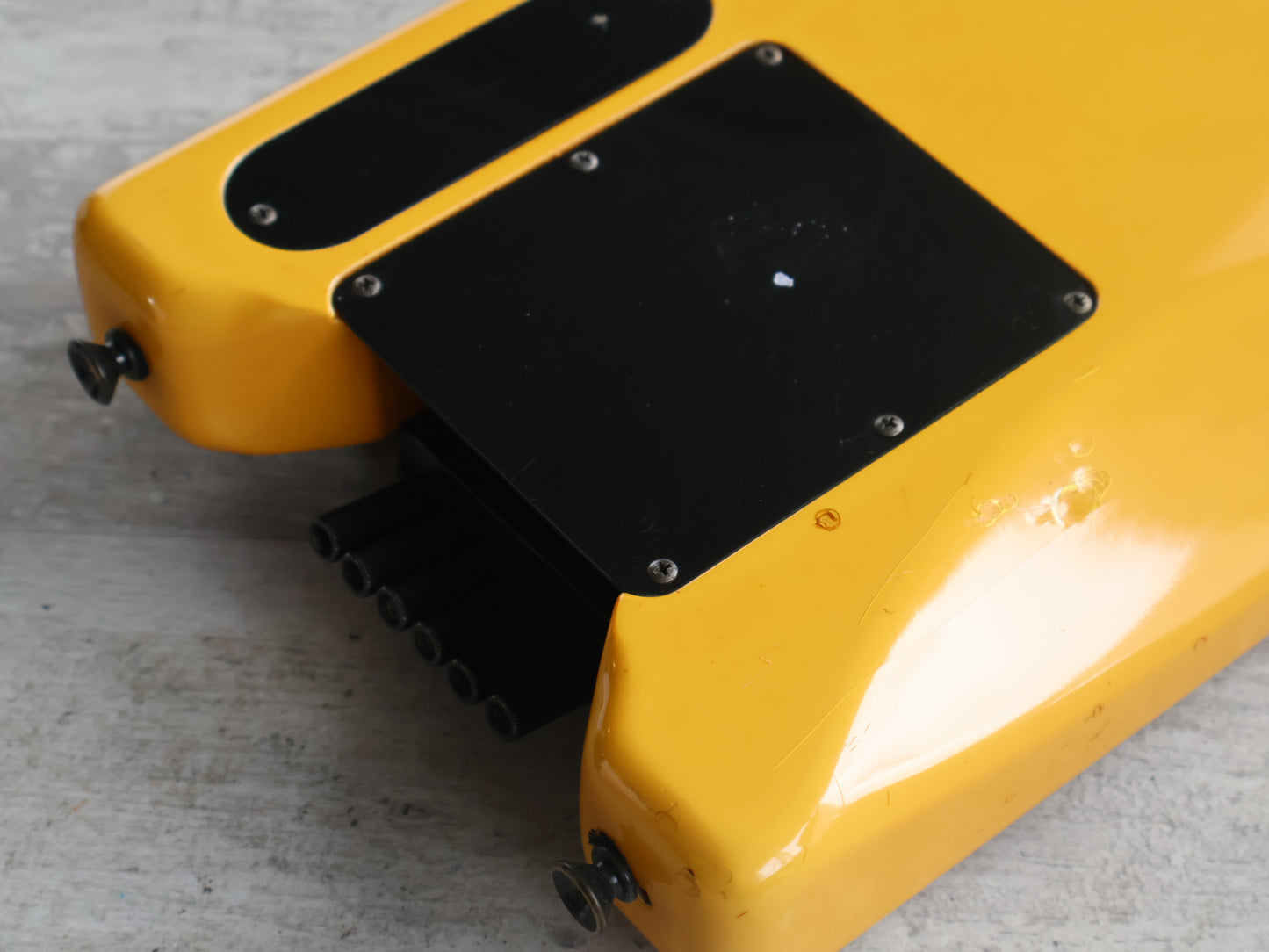 1986 Aria Pro II Japan Interceptor-II Headless Guitar (Yellowed White)