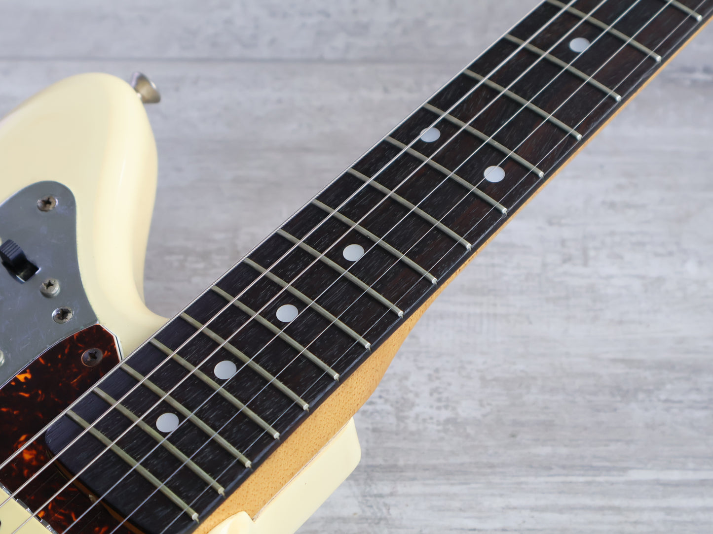 1986 Fender Japan "E Series" JG66-75 '66 Reissue Jaguar (Vintage White)