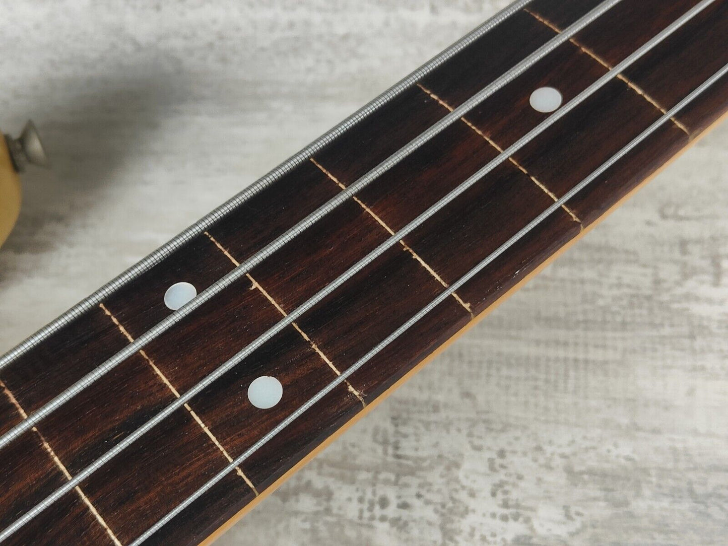 1983 Tokai TJB-70F Fretless Jazz Bass (Aged Olympic White)