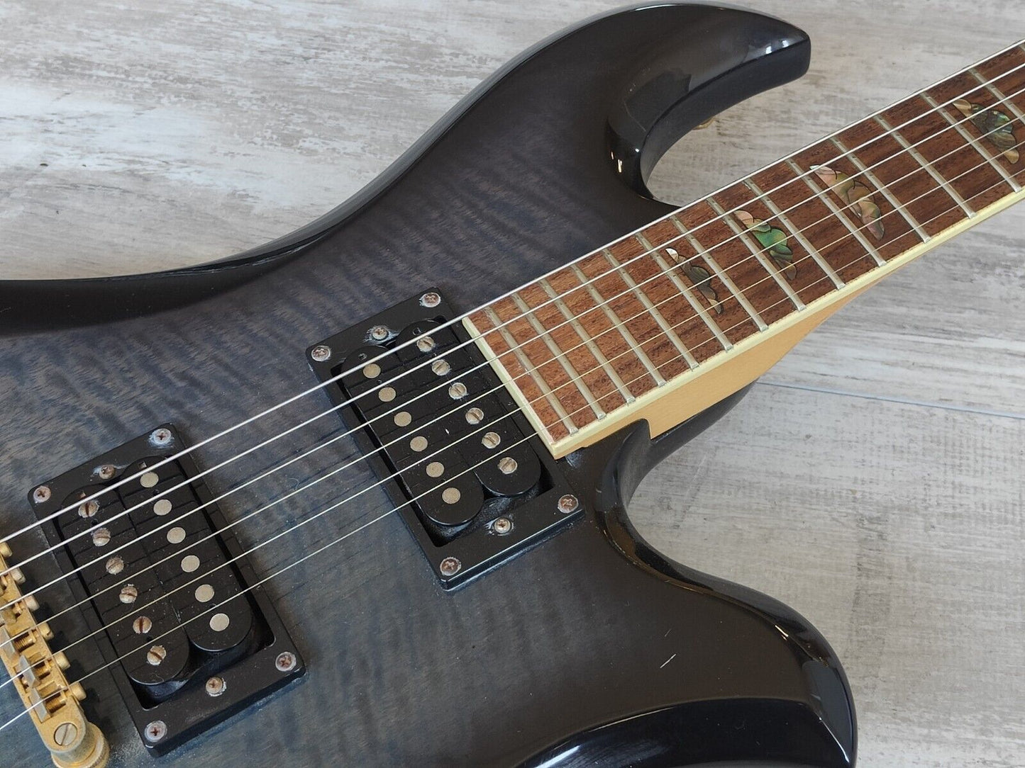 2000's BC Rich Eagle (Transparent Blue Black Flame Burst)